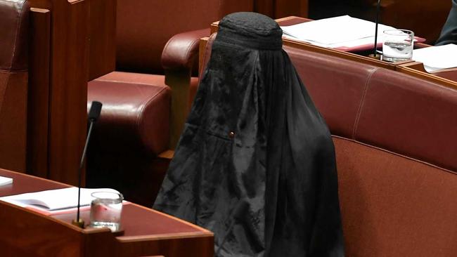 One Nation Leader Senator Pauline Hanson wears an Islamic veil in the Senate chamber at Parliament House in Canberra, Thursday, August 17, 2017. (AAP Image/Mick Tsikas) NO ARCHIVING. Picture: MICK TSIKAS