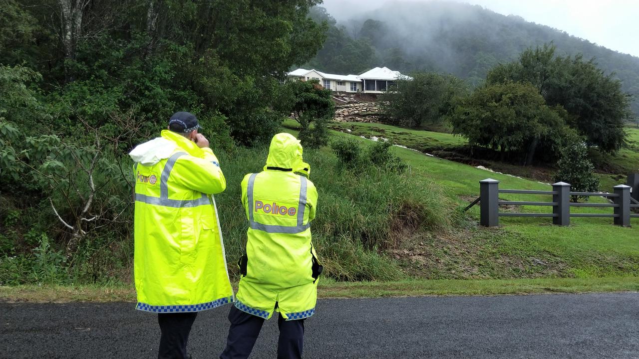 Police at Crest Hill Drive in Wongawallan. Picture: Jerad Williams.