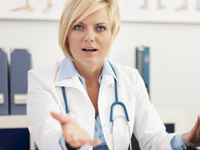 Displeased female doctor in her office