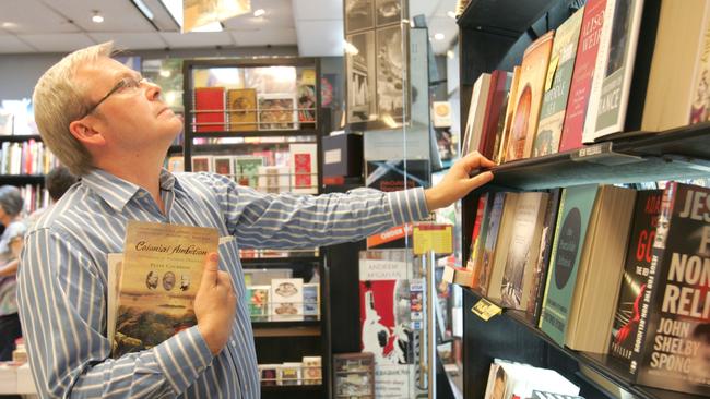 Former prime minister Kevin Rudd browses the selection at Folio Books. Picture: Jono Searle