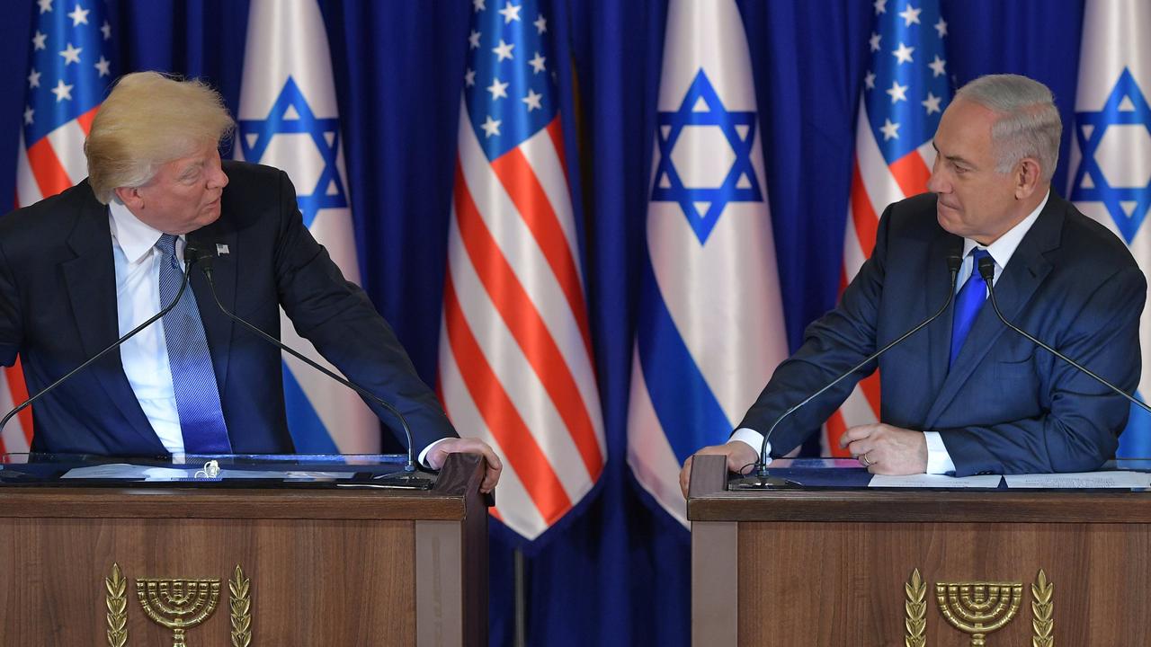 Good friends like Israeli Prime Minister Benjamin Netanyau (above with Trump in 2017) could ask for favours during the transition. Picture: Mandel Ngan/ AFP