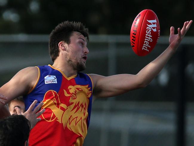 Thomas Gladman of Mulgrave wins a ruck duel during the EFL Division 2 football match between Bayswater and Mulgrave played at Bayswater Oval on Saturday 14th May, 2016. Picture: Mark Dadswell