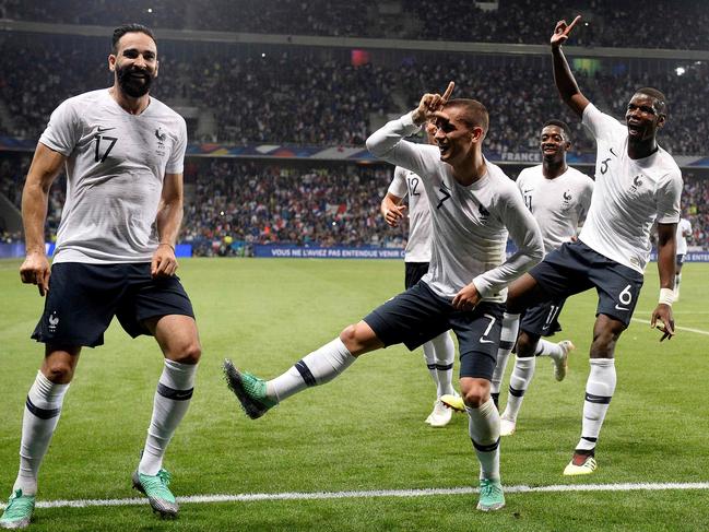 Antoine Griezmann (7) celebrates his goal with teammates. Picture: AFP