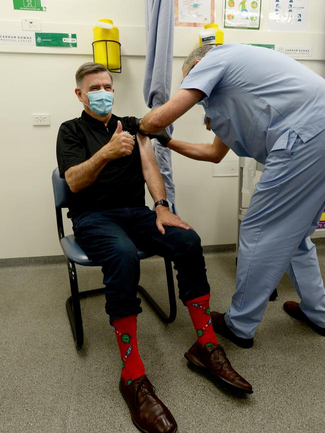 Brendan Murphy receiving his AstraZeneca vaccine.