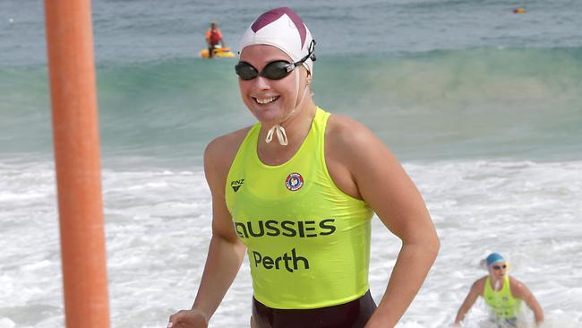 Laura Taylor, of Northcliffe wins the under-19 surf race at Scarborough Beach in Perth. Photo: HARVPIX.COM