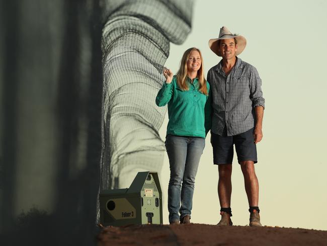 John Read and his wife Katherine Moseby on their EP property with a cat-proof and Felixer machine. Picture: Tait Schmaal