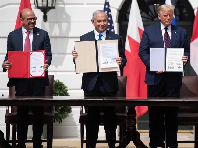 Bahrain Foreign Minister Abdullatif al-Zayani, Israeli Prime Minister Benjamin Netanyahu, US President Donald Trump. Picture: AFP