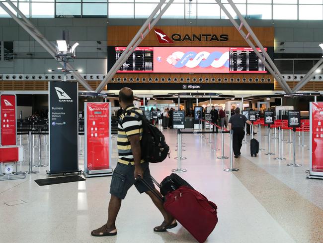 SYDNEY, AUSTRALIA : NewsWire Photos - SEPTEMBER 30 2024 ; A general view of the Qantas terminal at the Sydney Domestic Airport as Qantas engineers again walk out on the job over alleged pay disputes. A number of Qantas engineers Ã including maintenance engineers, who tow and marshall aircraftÃs Ã are set to walk off the job from 7am until 9am on Monday as strike action remains ongoing since Thursday. Brisbane, Sydney, Canberra, Melbourne, Adelaide, and Perth airports are all expected to be affected by the action, which has been brought on by increased calls for better pay. Picture: NewsWire / Gaye Gerard