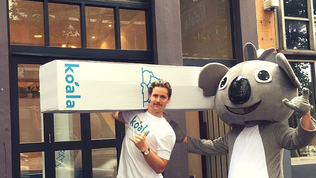 Danny Milham and his brand mascot outside a Koala store.