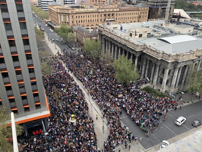 Thousands of people rally outside Parliament House, demanding action for climate change. Picture: Tait Schmaal.