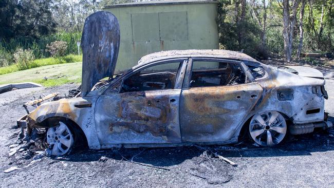 A burnt-out car which is believed to be linked to shooting. Picture: NewsWire / Jeremy Piper