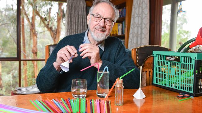 Dr Rob Morrison of the Curiosity Show with a plastic straw flute and siphon. He says plastic straws are hugely useful in many educational activities and student projects. Picture: Brenton Edwards