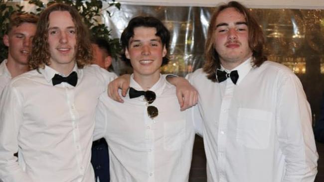 School leaver (centre) Jude Lane says he was lucky to escape unharmed after a dangerous schoolies stunt. Picture: Facebook