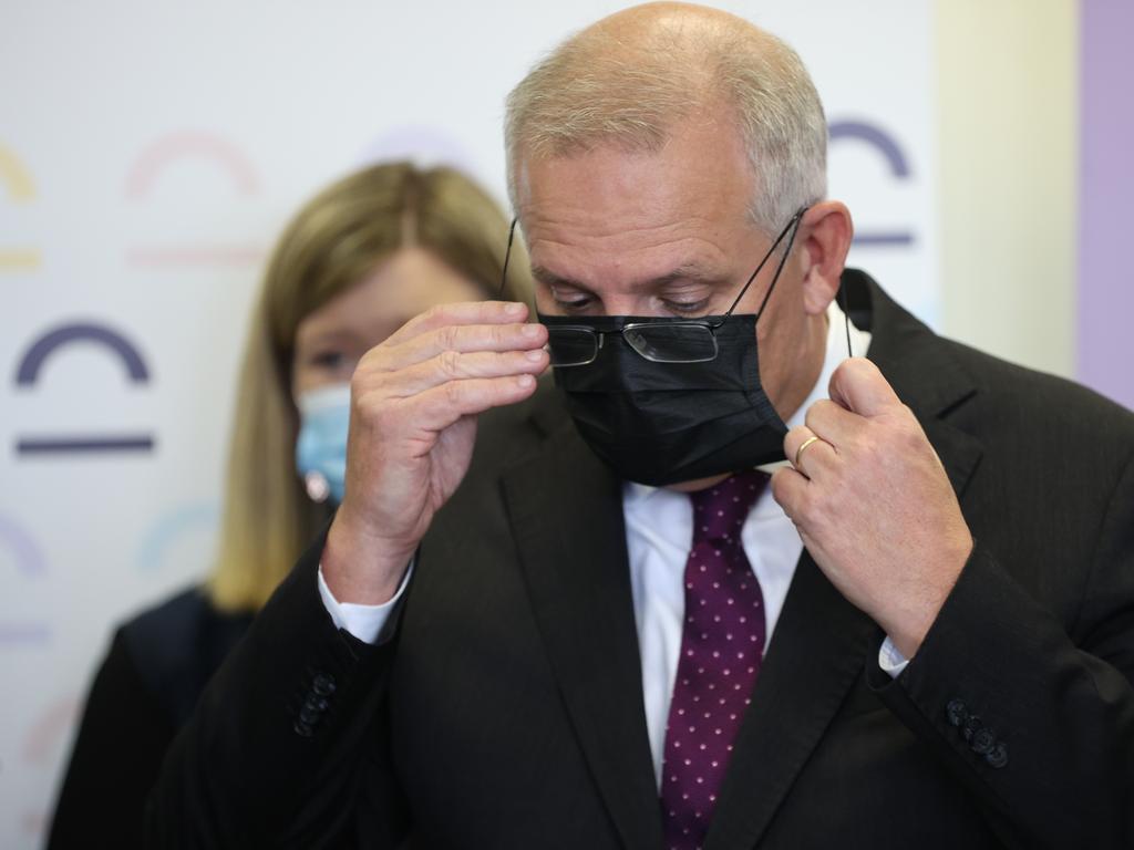 Scott Morrison applies a hammock to his face in Launceston on Thursday. Picture: Jason Edwards