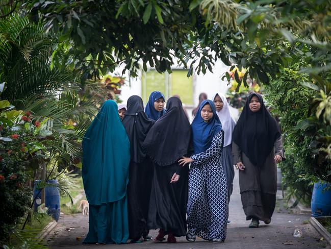 Female students at the Al-Mukmin Islamic boarding school in Indonesia where Saudi Arabia finances scores of schools. Picture: Graham Crouch