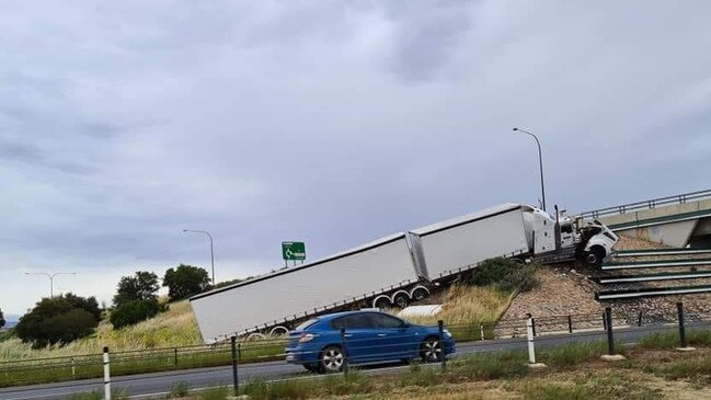 A truck came off the road on the Northern Expressway this morning. Picture: Facebook