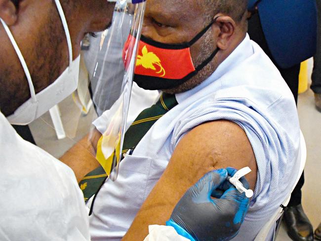 Papua New Guinea;s Prime Minister James Marape receiving a dose of the AstraZeneca Covid-19 vaccine in Port Moresby.