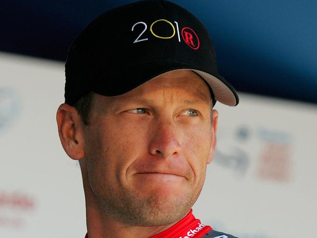 Lance Armstrong racing for RadioShack stands on the stage during the teams presentation prior to the start of the Tour Down Under cycling race in Adelaide on January 17, 2010. The Tour Down Under will be held from January 17-24. AFP PHOTO / Mark GUNTER