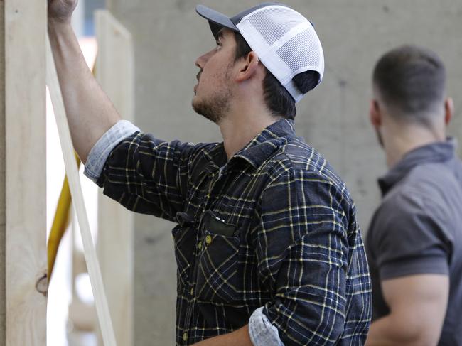 Students are seen working at Holmesglen TAFE in Melbourne, Wednesday, March 27, 2019. (AAP Image/Erik Anderson) NO ARCHIVING