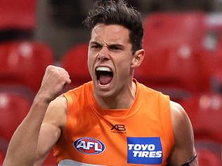 Giants Josh Kelly celebrates kicking a goal  during AFL match between the GWS Giants and Collingwood at Giants Stadium. Picture. Phil Hillyard