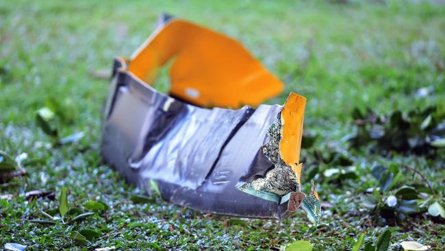 Debris from the crash was also found at the park opposite the Cairns hotel. Picture: NewsWire/ Brendan Radke