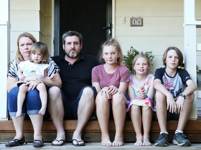 Renee and Grant Pettifer with their kids Emily 14, Nicolaas 11, Zoe 10 and Stephanie 1. The family is really struggling to make ends meet with the rising cost of living. Picture: Tim Hunter