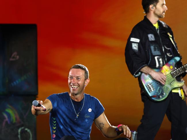 Chris Martin pointed out a boy who was being squished in the crowd. Picture: Jonathan Ng