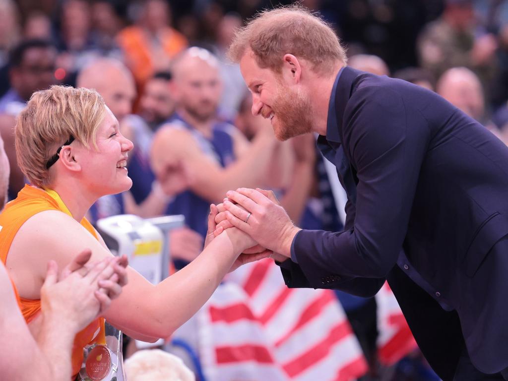 Prince Harry celebrates with Team Netherlands after they won the Silver Medal at the Wheelchair Basketball Finals during day seven of the Invictus Games. Picture: Getty Images for the Invictus Games Foundation