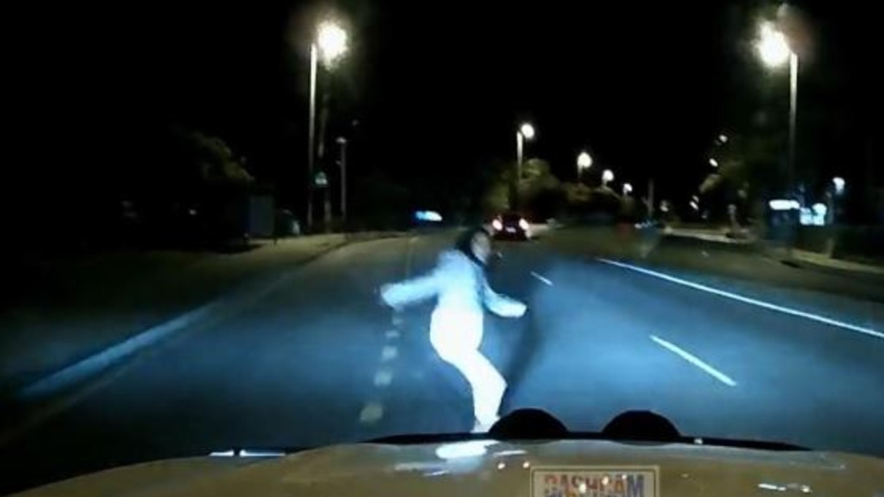 Earlier this year, eerie footage emerged of a woman throwing herself in front of a car on a quiet road south of Brisbane. Picture: Dash Cam Owners Australia