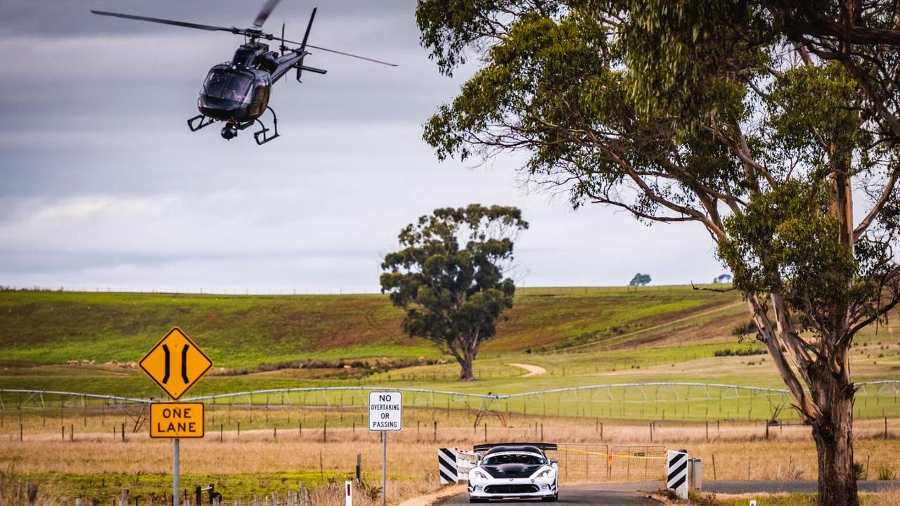 A helicopter film crew follows Jason White during Targa Tasmania. Picture: Supplied