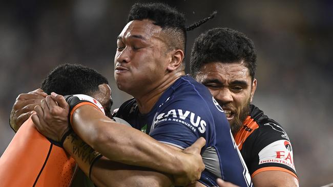 Kulikefu Finefeuiaki is tackled during round 18. (Photo by Ian Hitchcock/Getty Images)