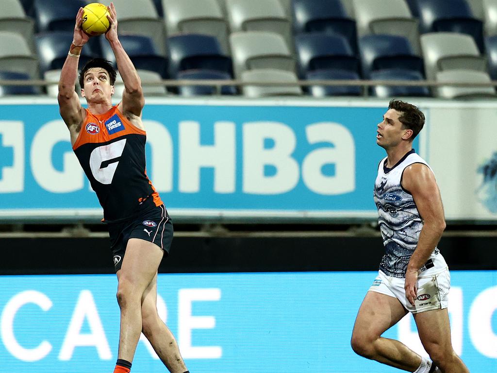 GWS defender Sam Taylor (left) received no votes despite completely outclassing Geelong’s Tom Hawkins. Pic: Michael Klein