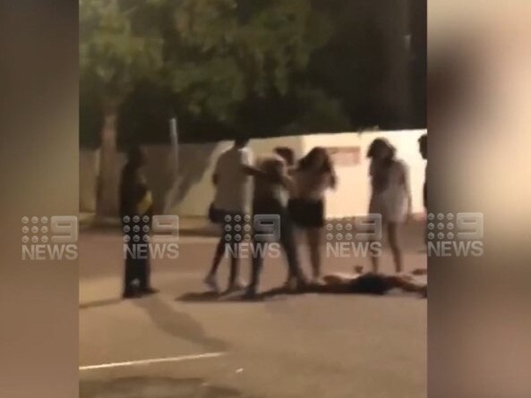 A man lays on Peel St during an alleged attack in the early hours of Christmas Eve. Picture: Channel Nine