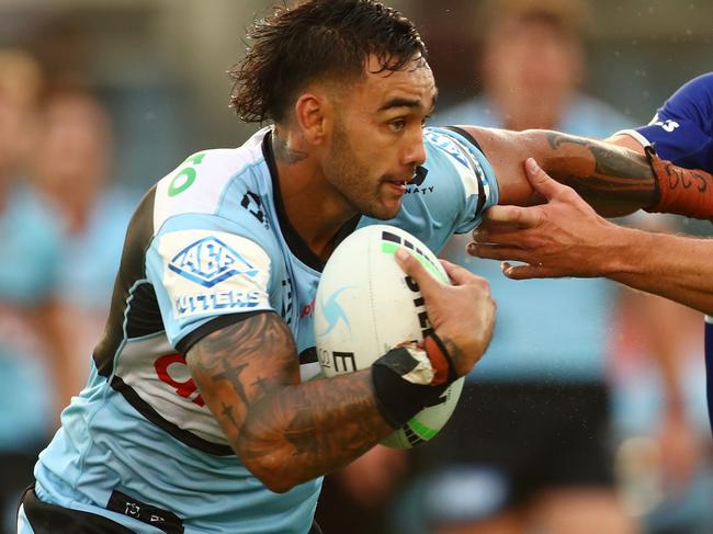 SYDNEY, AUSTRALIA - FEBRUARY 28: Briton Nikora of the Sharks is tackled during the NRL Trial Match between the Cronulla Sharks and the Canterbury Bulldogs at PointsBet Stadium on February 28, 2022 in Sydney, Australia. (Photo by Mark Metcalfe/Getty Images)