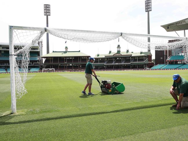 SCG Trust grounds manager Justin Groves and SCG curator Adam Lewis at the SCG where they have transformed the ground into a soccer pitch ahead of the A League Derby this Saturday night. Picture. Phil Hillyard