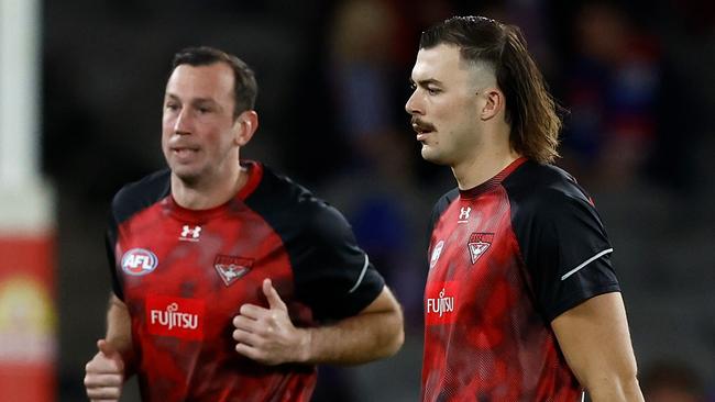 Essendon ruckmen Todd Goldstein (left) and Sam Draper are set to play with each other again after Draper missed the Eagles win with a knee complaint. Picture: Michael Willson / Getty Images