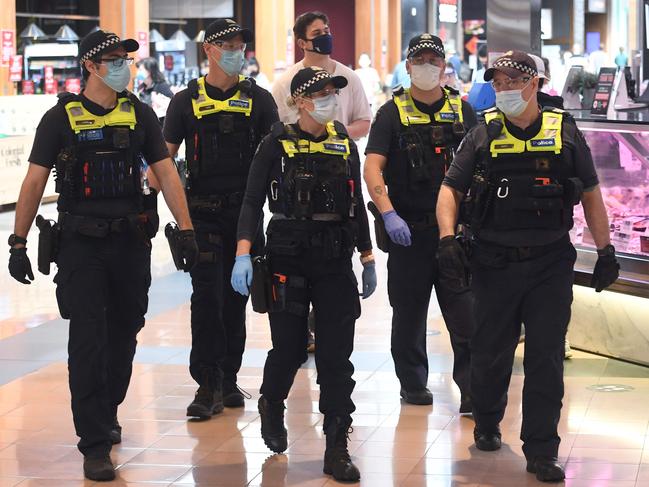 Police patrol a shopping centre in the Melbourne suburb of Chadstone. Picture: AFP