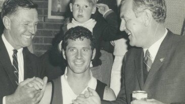 Martin Cross, centre, after Myrtleford's 1970 grand final win in Ovens and Murray league. Picture: Supplied