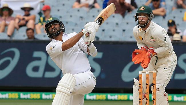 Pakistan’s Sohail Khan smashes a Nathan Lyon delivery for six on Wednesday.