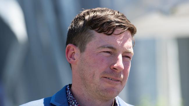 Trainer Ben Currie is seen after Jag Guthmann-Chester rode Mishani Vaidra to victory in race 2, the BenchMark 70 Handicap, during Tattersalls Celebration Season Race Day at Doomben Racecourse in Brisbane, Saturday, November 24, 2018. (AAP Image/Albert Perez) NO ARCHIVING, EDITORIAL USE ONLY