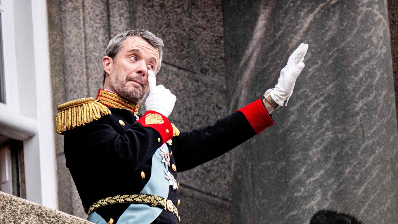 King Frederik X of Denmark waves to the crowd after the a declaration of the King's accession to the throne, from the balcony of Christiansborg Palace in Copenhagen, Denmark on January 14, 2024. Denmark turned a page in its history on January 14 as Queen Margrethe II abdicated the throne and her son became King Frederik X, with more than 100,000 Danes turning out for the unprecedented event. (Photo by Nils Meilvang / Ritzau Scanpix / AFP) / Denmark OUT