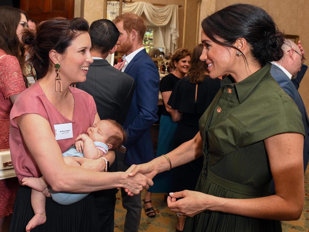 Meghan meets a baby and everyone swoons! Missy Higgins holding daughter Luna. Picture: Andrew Parsons - Pool/Getty Images