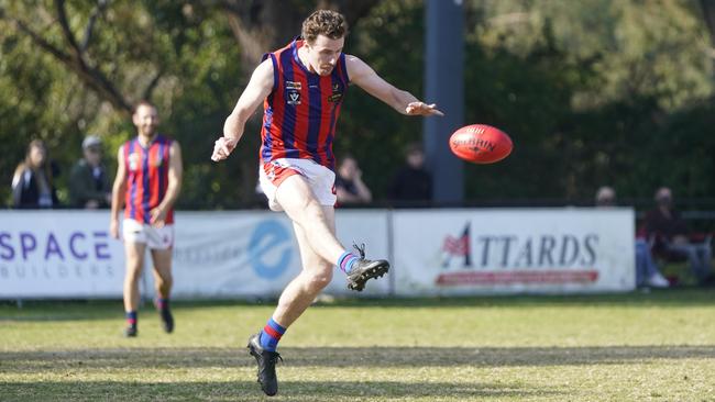 Clayton Barnes takes a kick for Rye. Picture: Valeriu Campan