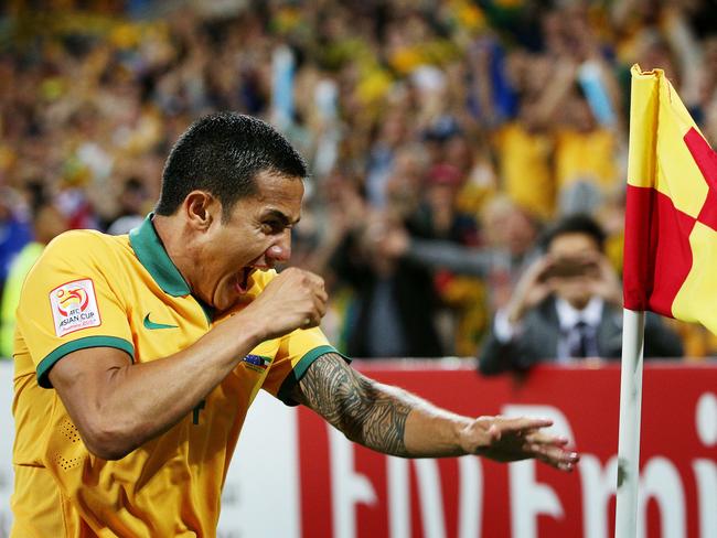 Tim Cahill celebrates scoring for the Socceroos.