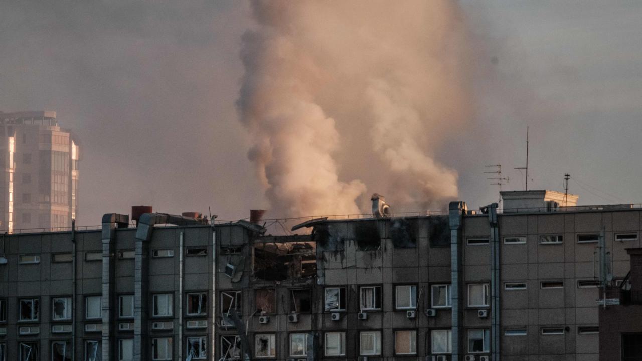 Smoke rises from a partially destroyed building in Kyiv on October 17, 2022, amid the Russian invasion of Ukraine. Picture: AFP