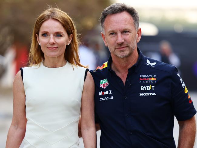 BAHRAIN, BAHRAIN - MARCH 02: Oracle Red Bull Racing Team Principal Christian Horner and Geri Horner walk in the Paddock holding hands prior to the F1 Grand Prix of Bahrain at Bahrain International Circuit on March 02, 2024 in Bahrain, Bahrain. (Photo by Mark Thompson/Getty Images)