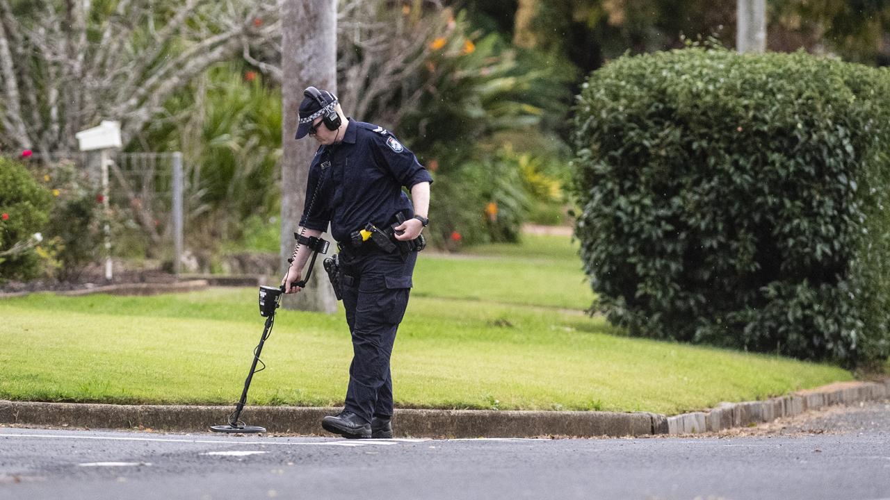 Investigators at a police incident in Harristown, Friday, May 6, 2022. Picture: Kevin Farmer