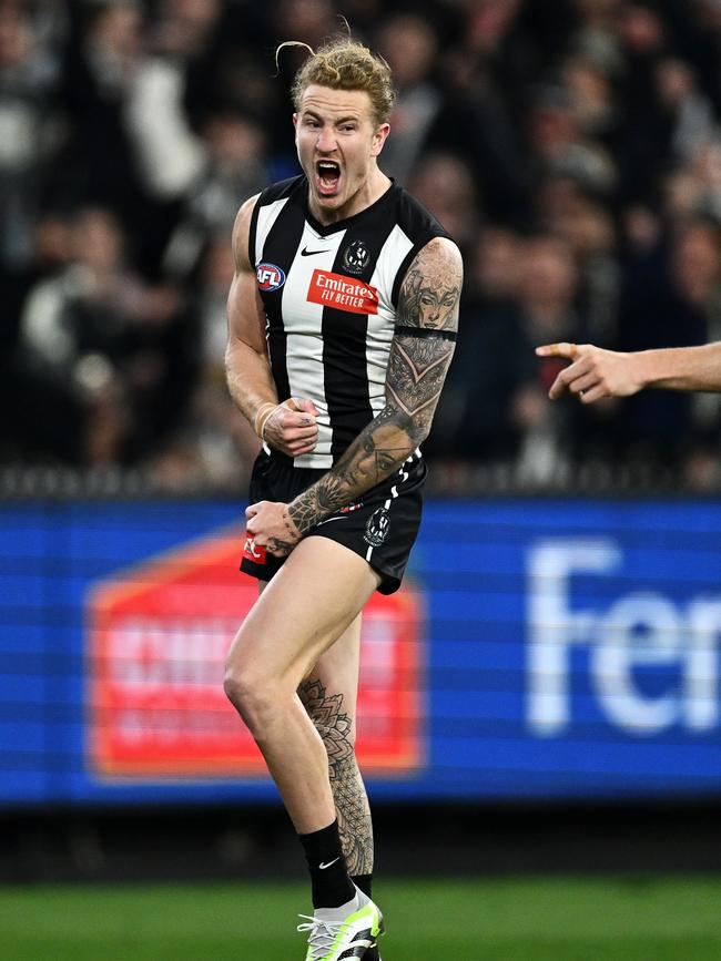 McCreery of the Magpies celebrates kicking a goal against GWS in the preliminary final. Picture: Quinn Rooney/Getty Images