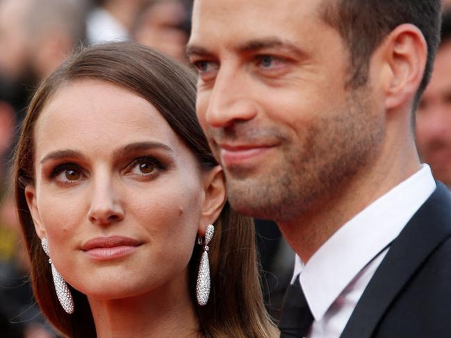 (FILES) US-Israeli actress and director Natalie Portman (L) and her husband French choreographer Benjamin Millepied pose as they arrive for the opening ceremony of the 68th Cannes Film Festival in Cannes, southeastern France, on May 13, 2015. Portman has divorced Millepied, US media reported on March 8, 2024. The "Black Swan" star filed last July to end her marriage of 11 years to Millepied, People magazine said. The divorce was finalized in France last month, it said, citing a Portman representative. (Photo by Valery HACHE / AFP)