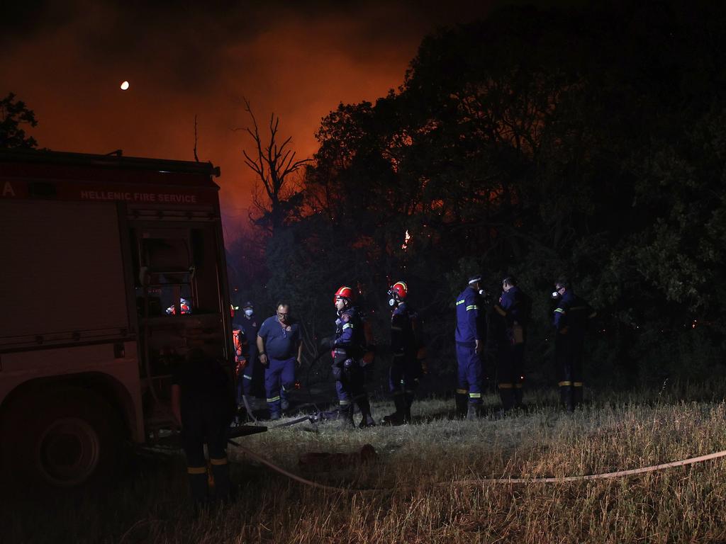 Efforts to extinguish the wildfires continue as residents are evacuated from the towns of Avra, Atarni and Plaka near Evros. Picture: Ayhan Mehmet/Anadolu Agency via Getty Images